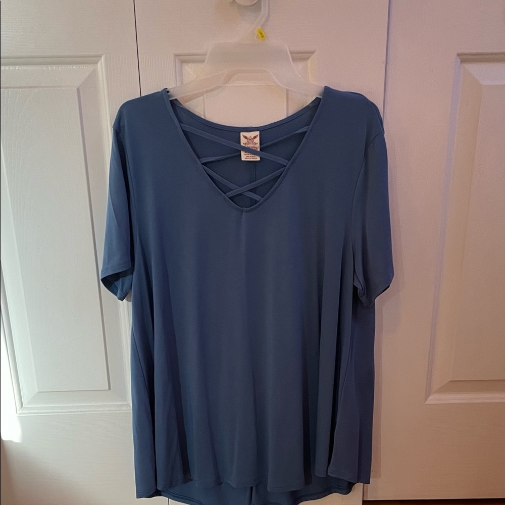 Large Blue Shirt With Crosses On The Chest